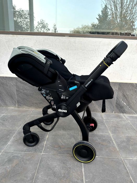 Автокресло и детская коляска Doona