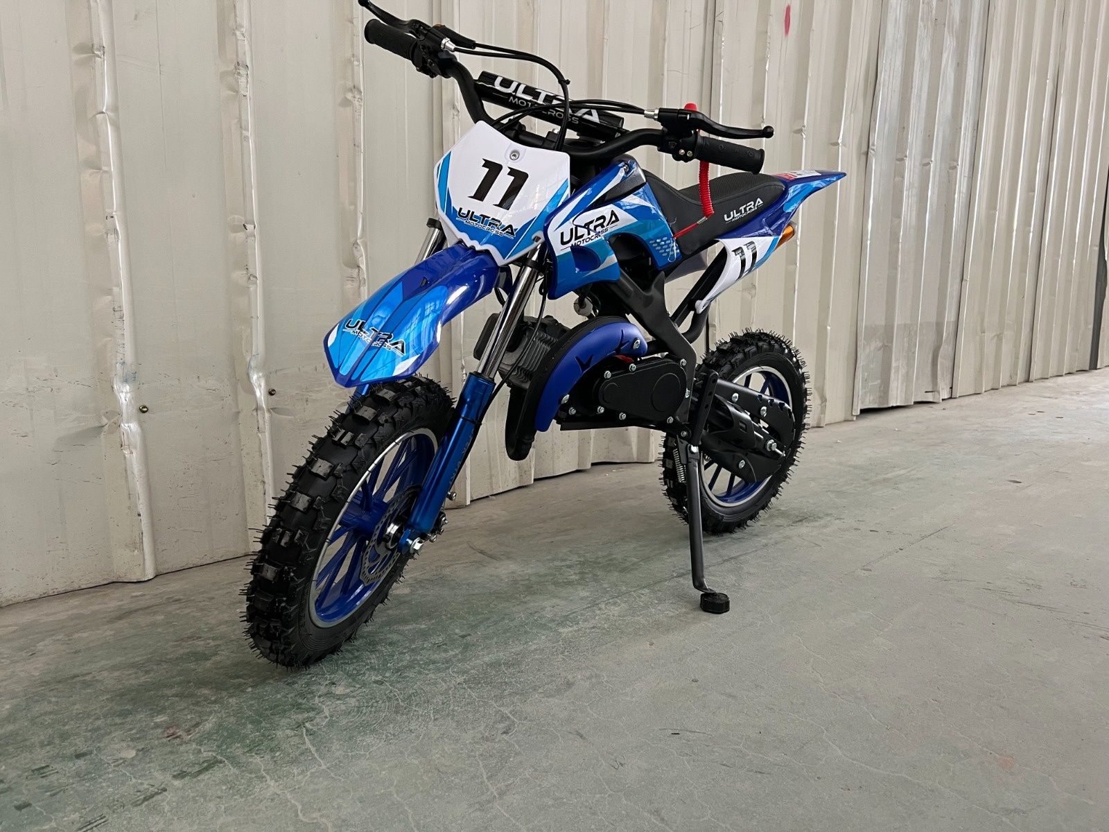 Mini motoreta cross dirt pit pocket bike pe benzina de 49cc in 2 timpi