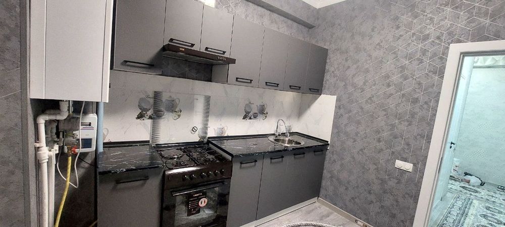 Санат сарои якинида