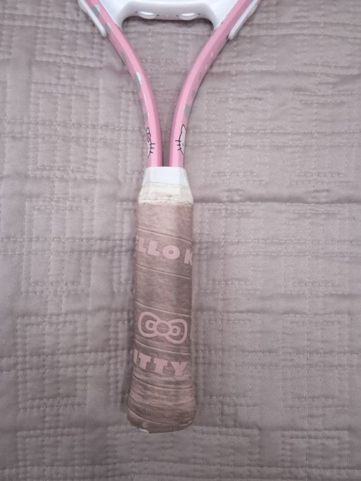 Теннисная ракетка