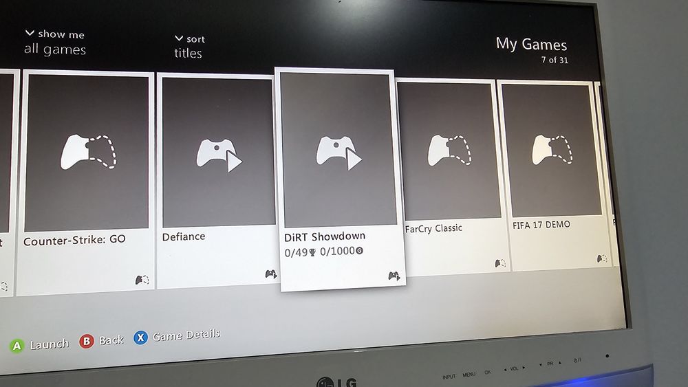 Xbox slim complet 1 maneta originala + 12 jocuri Minecraft