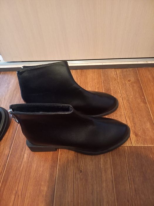 Продам новый сапоги