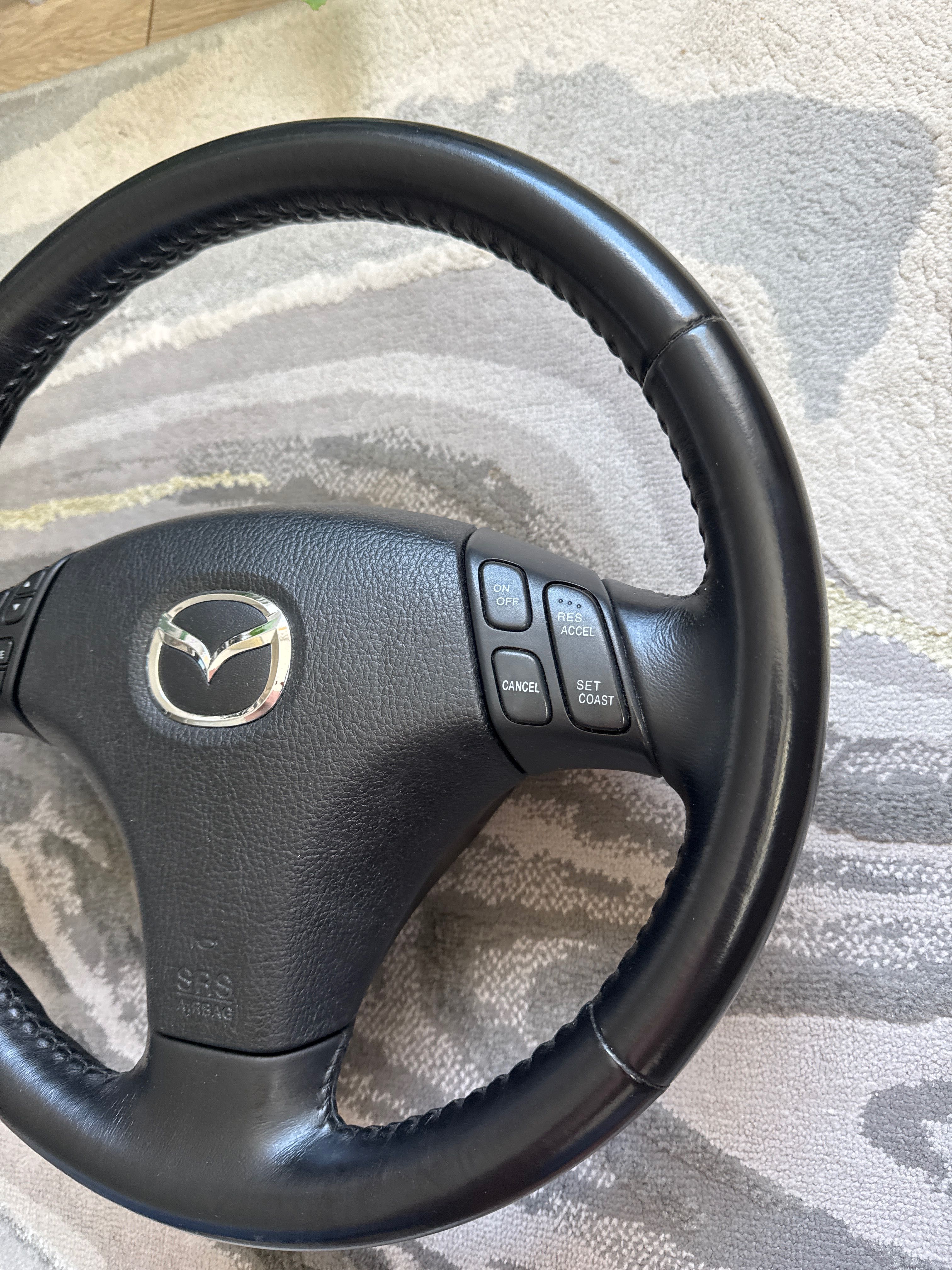 Mazda 6 кожен волан Мазда 6