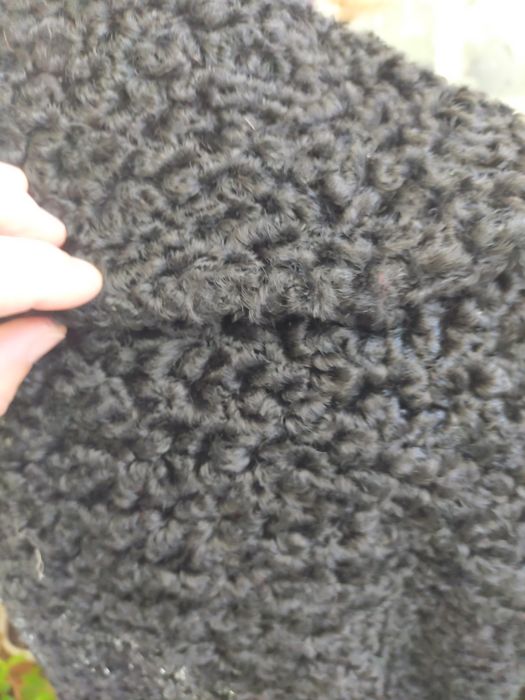 Haina de blana artificiala.Astrahan