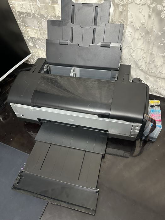Epson Stylus PHOTO 1410 A3 pechatlari tinniq aybi yoq holati ideal