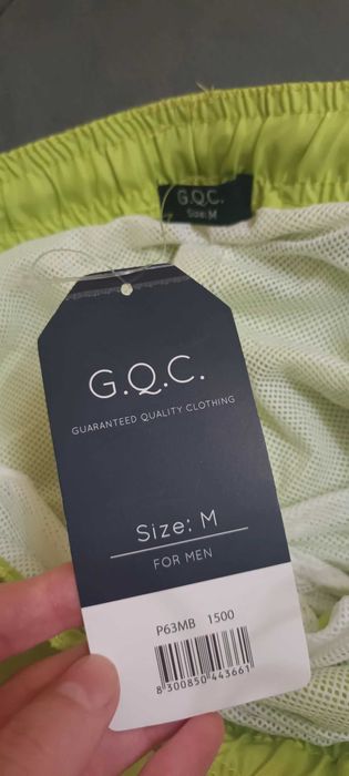 Нови мъжки шорти с етикет на марката G.Q.C.