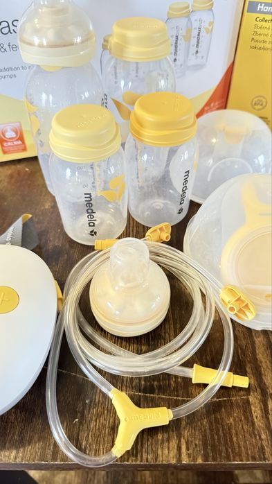 Шишета и чашки за помпа за кърма Медела Medela
