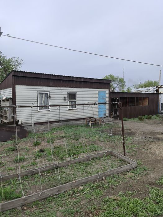 Продам  дом в районе Лодочного.