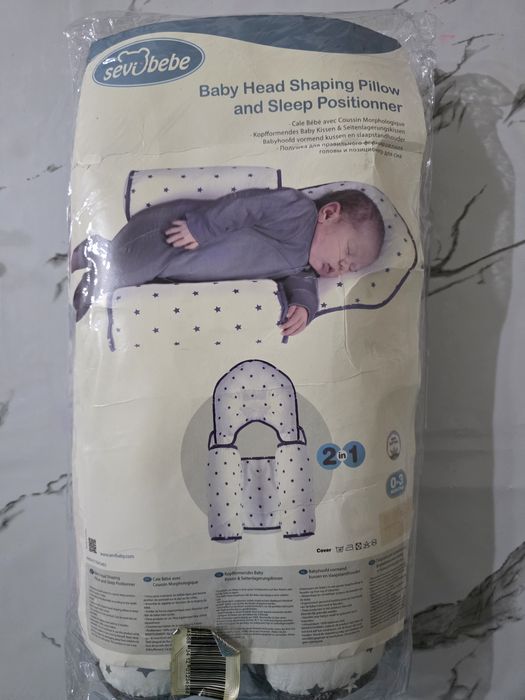 Позиционер для сна новорожденным