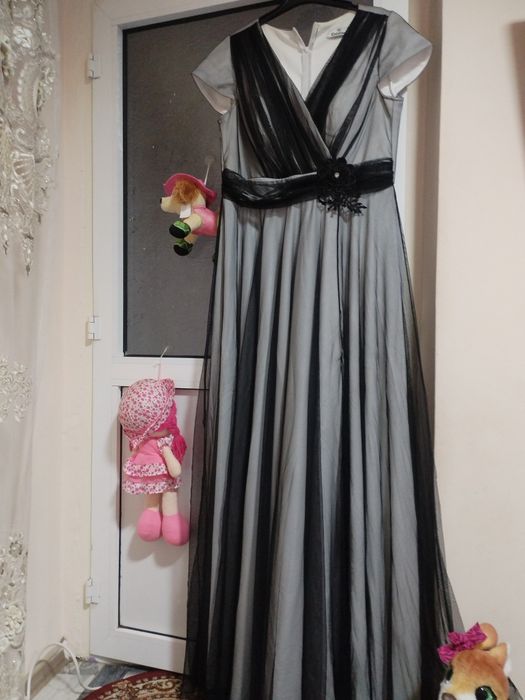 Rochie de ocazie cu un bust de 100neintins si se mai intinde