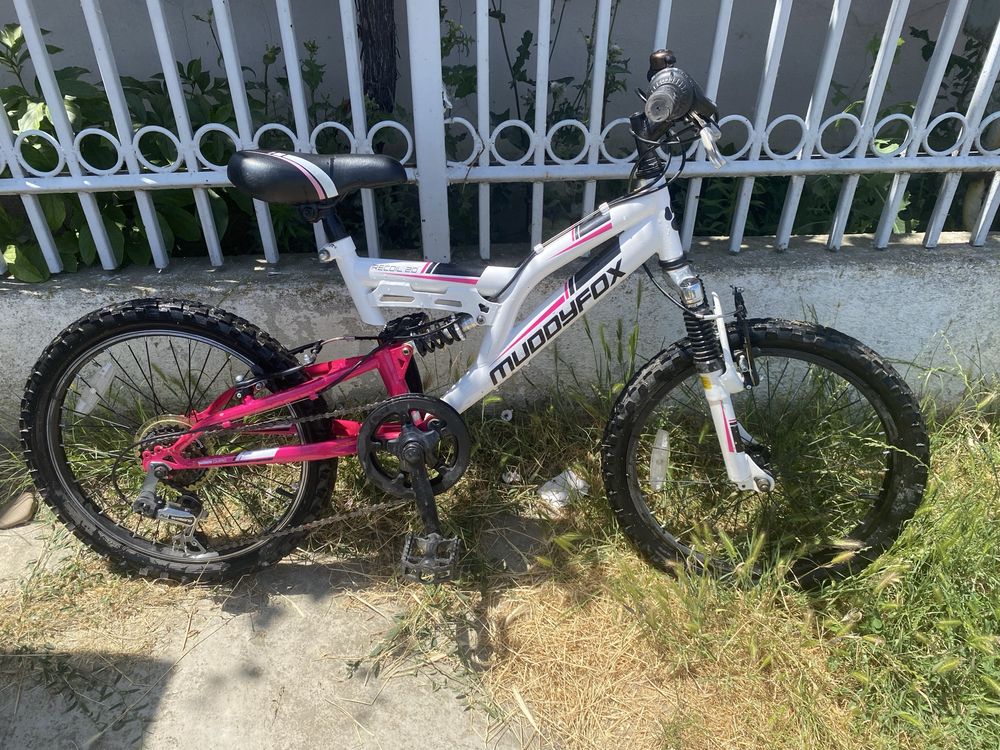 Bicicleta Muddyfox ,de tip mountain bike, cu suspensie completa
