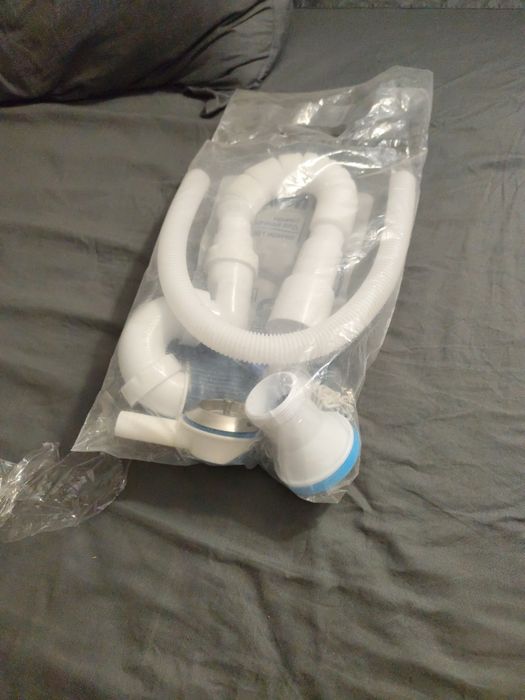 Сливной шланг для ванной новый