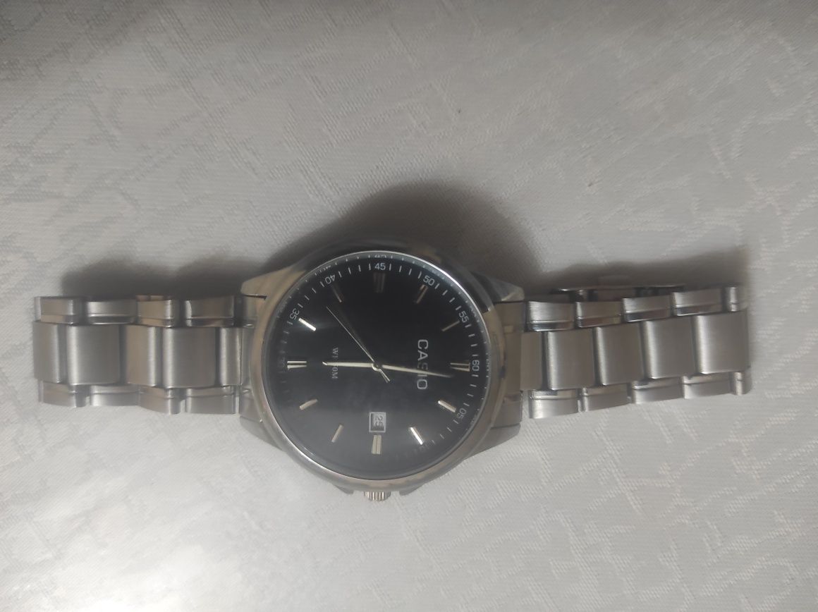 6000тг casio часы