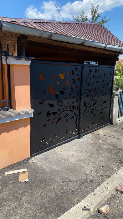 Porti si garduri din tabla debitata sau jaluzea