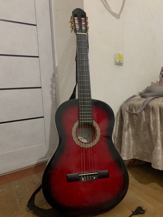 Гитара янги кам ишлатилган