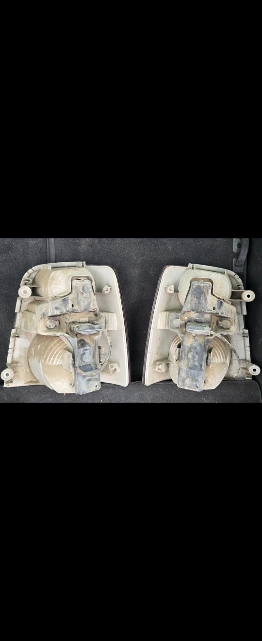 Triple,lămpi stanga și dreapta spate Vw touran an 2005