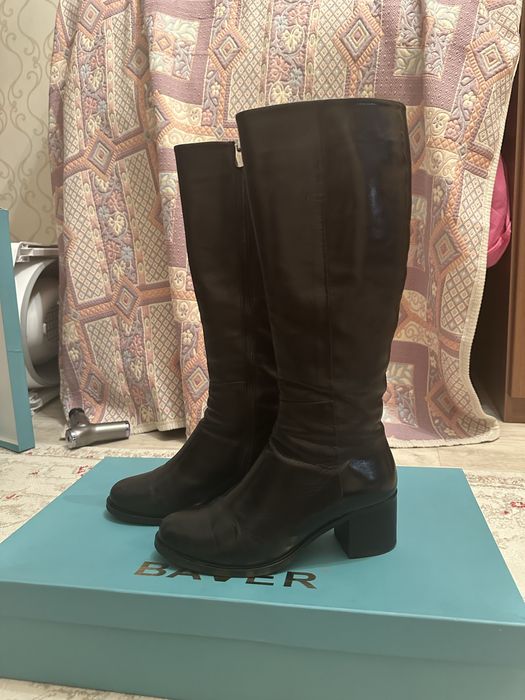 Продается кожанные сапоги.