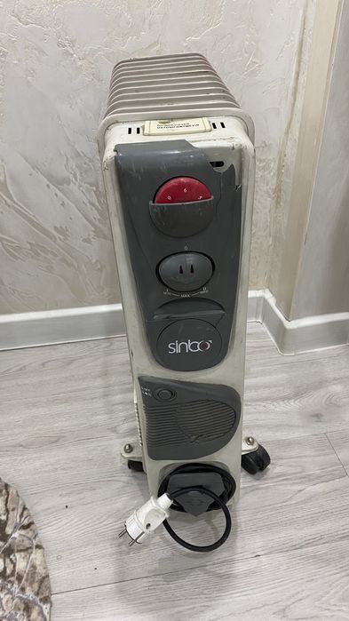 Масляный радиатор печка