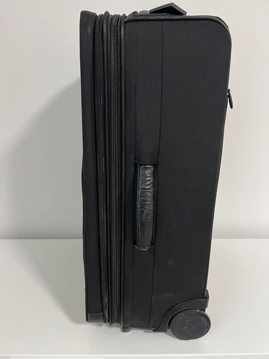 Trollere upright extensibil Samsonite si Buxton