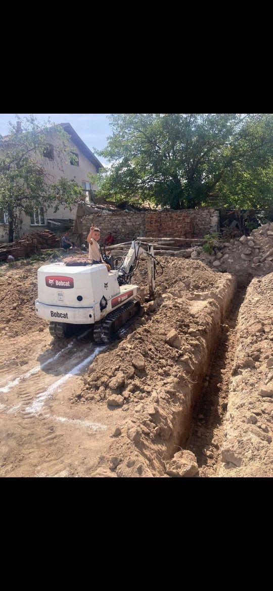 Мини багер Bobcat 220