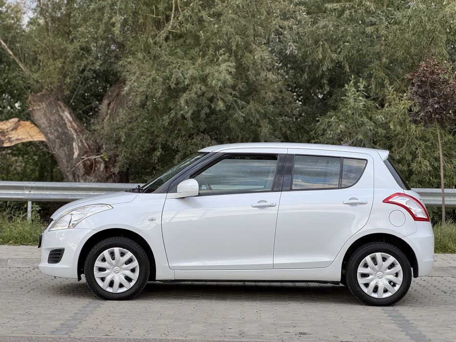 Suzuki Swift 4x4 - 2012 - 1.3 benzina - Alb perlat / Klima