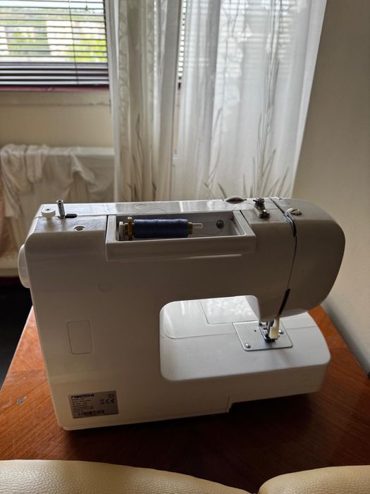 Masina de cusut nechi