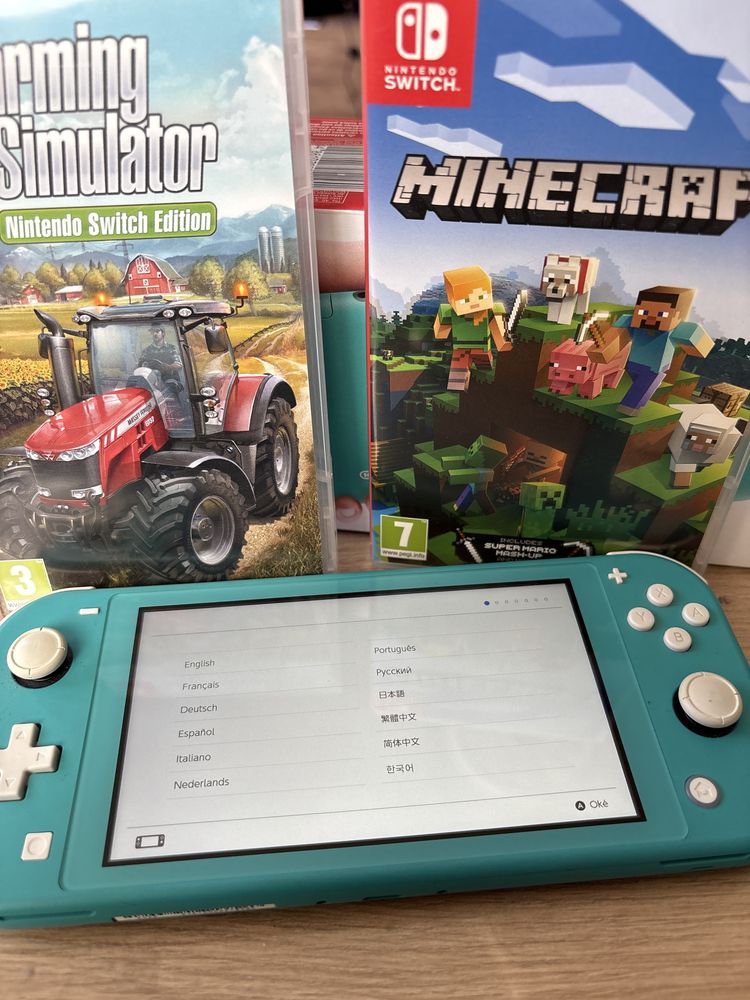 Nintendo switch lite + 2 игри