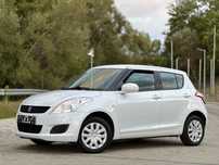 Suzuki Swift 4x4 - 2012 - 1.3 benzina - Alb perlat / Klima