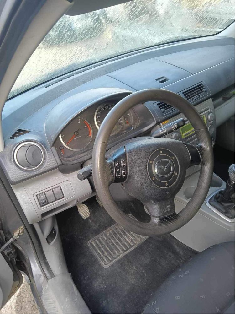 Mazda 2 - на части