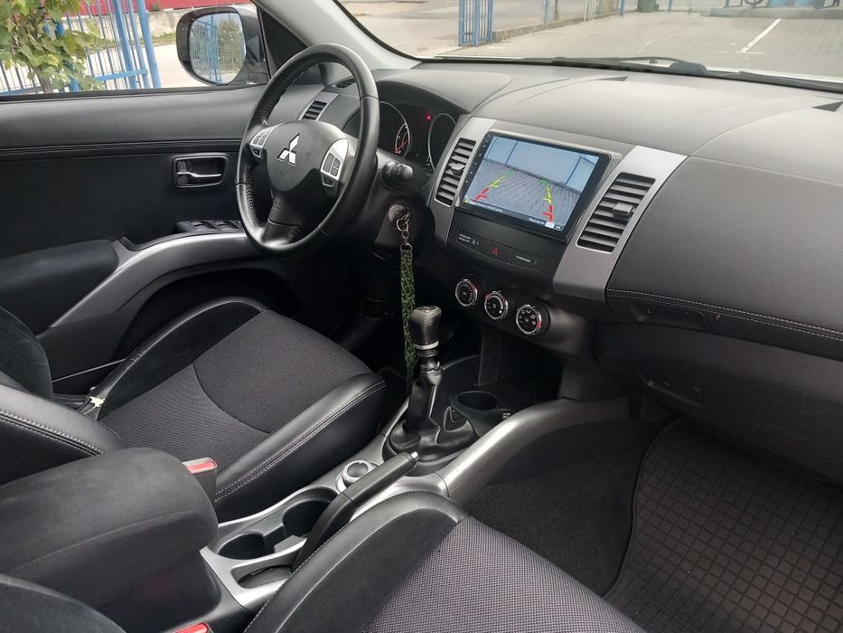 Mitsubishi Outlander an 2012 . Euro5.  7LOCURI.