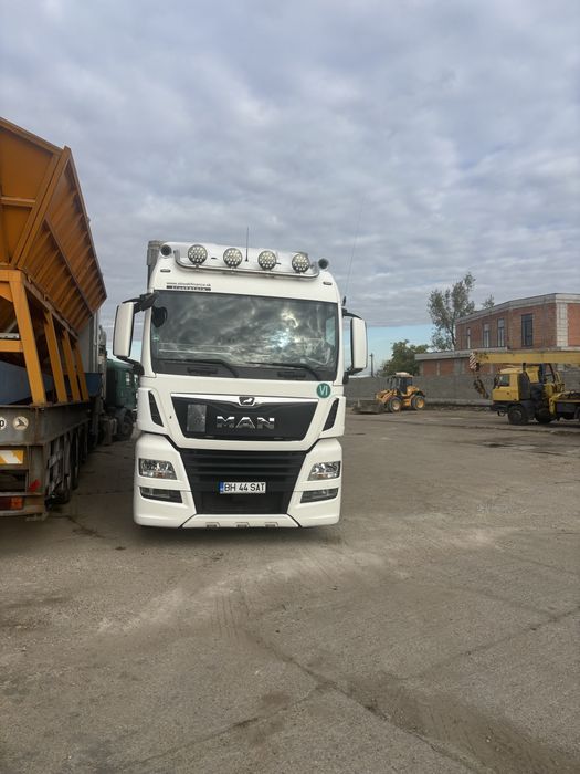 Man TGX 460-semiremorca Fliegel