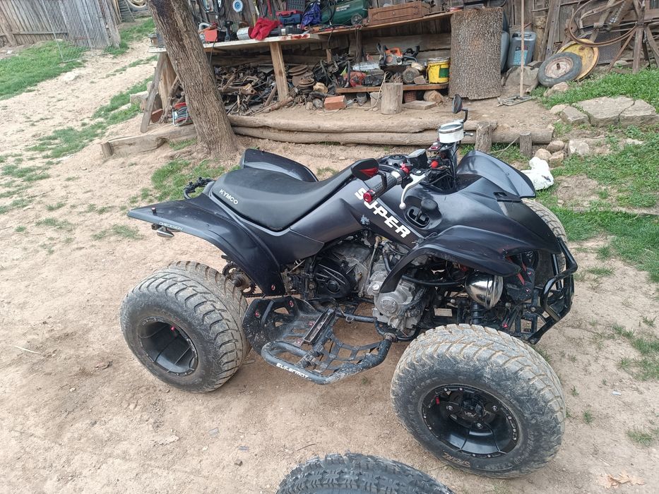 Vând ATV KYMCO DE 300cc ,și cu roți de schimb