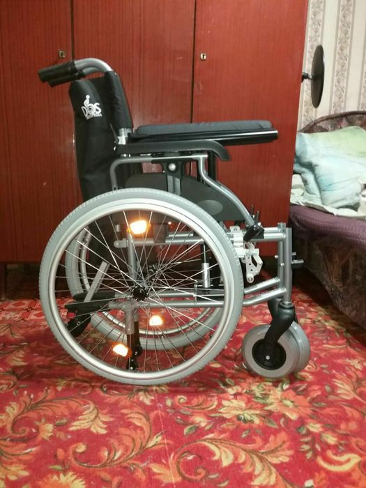 Продам новую инвалидную коляску