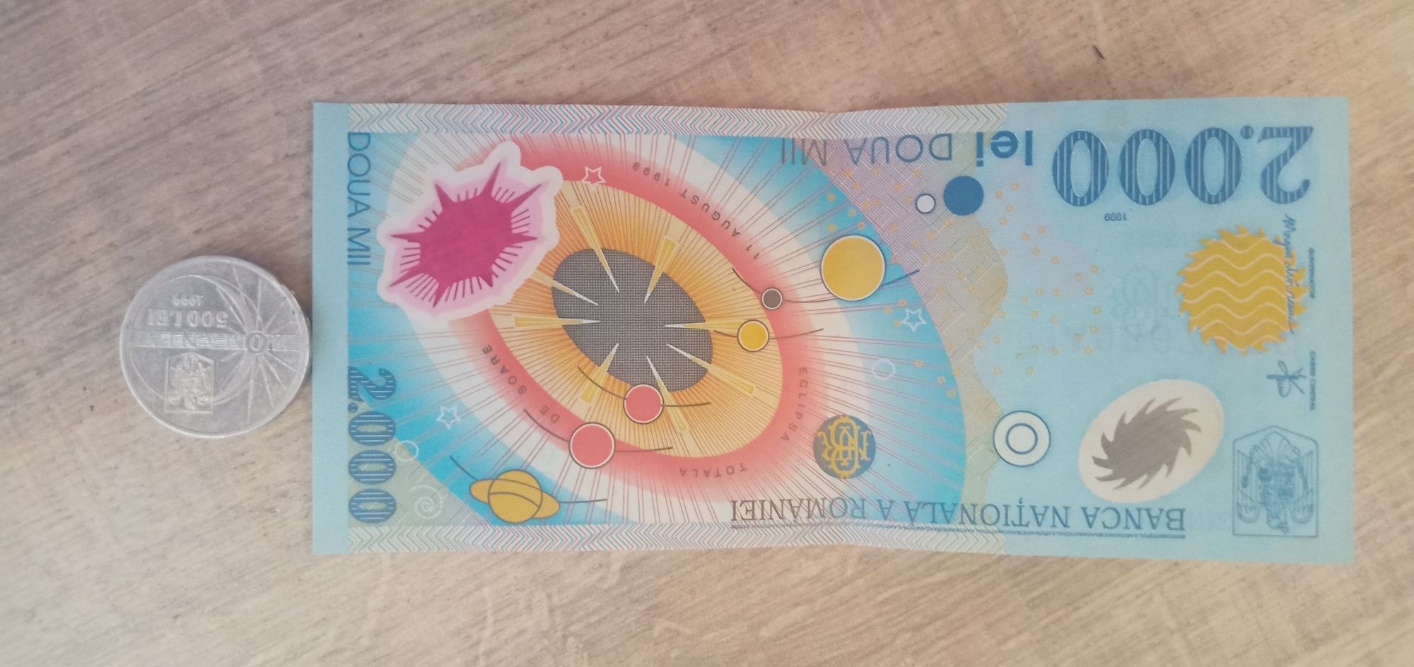 Bancnota si moneda cu eclipsa