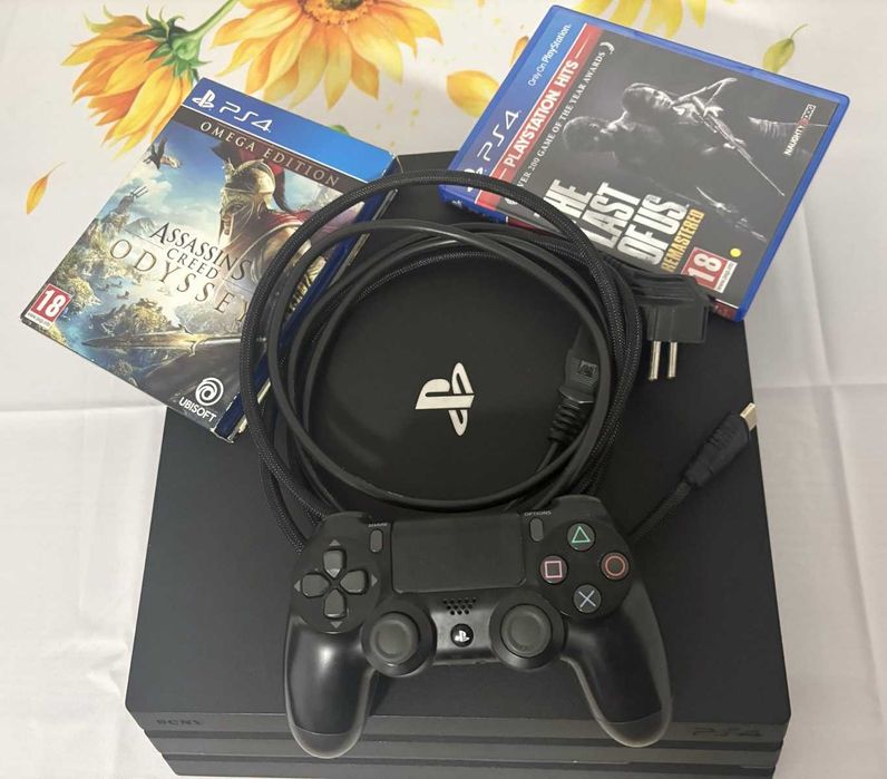 PS4 Pro 1TB cu doua jocuri si o maneta