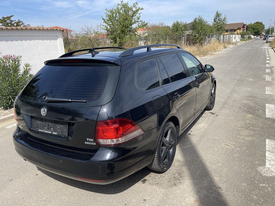 VW Golf VI 1.6 TDI, navigatie,pilot automat,klima,geamuri electrice