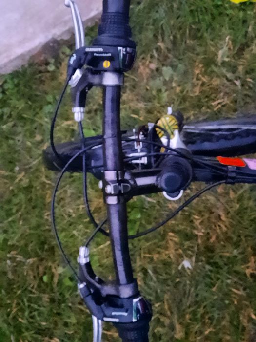 Vând bicicleta cu roți de 26