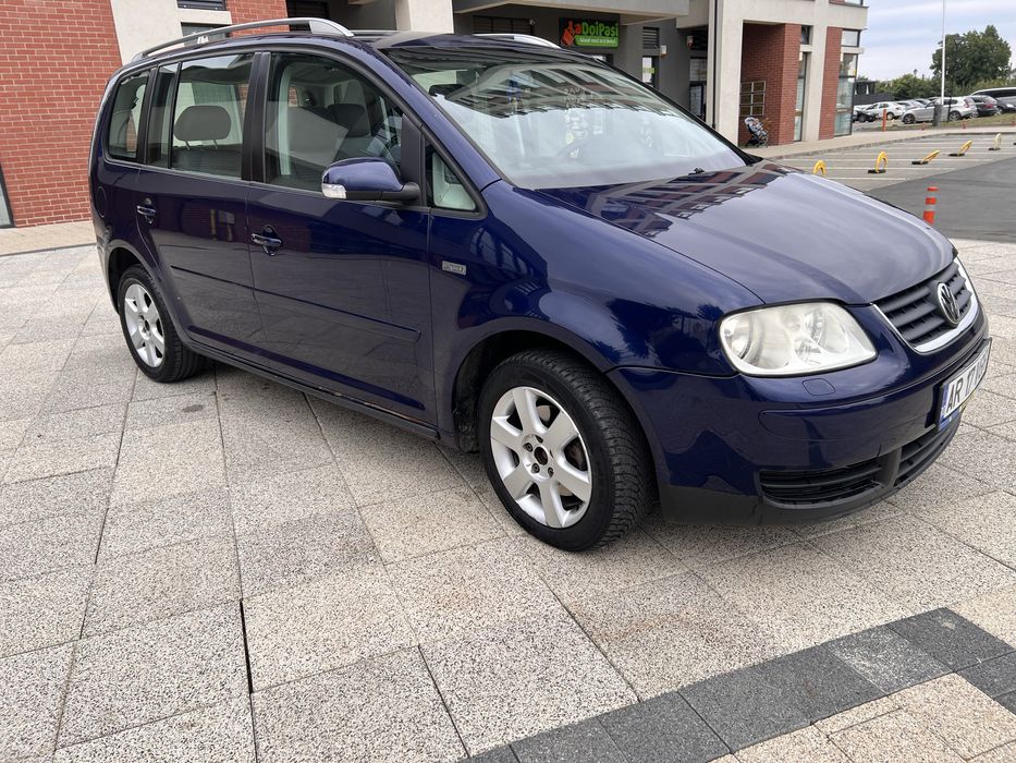 Vand sau schimb vw turan dsg 7 locuri