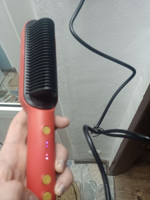 Perie de par uscat îndreptat