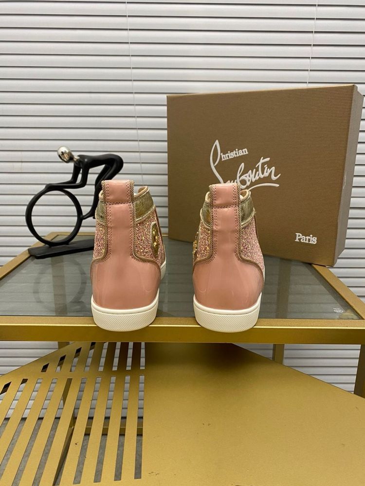 Louboutin “WMNS”