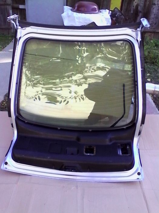 Haion luneta Renault Laguna,inchidere elect.,motoras stergator,brat..