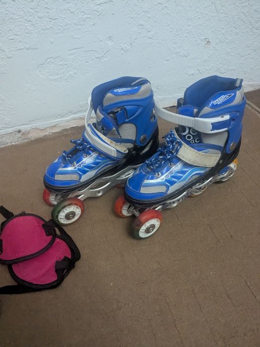 Роликовые коньки