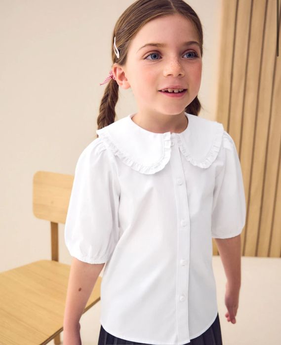 Новая школьная блузка  NEXT 134 см