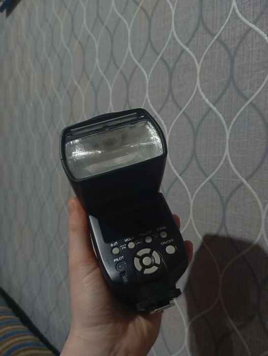 Вспышка на фотоаппарат