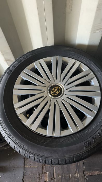 Продам покрыка с дисками + калпак тойота.