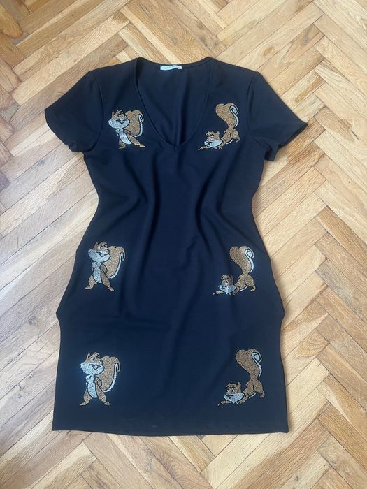 Дамска рокля с джобчета.