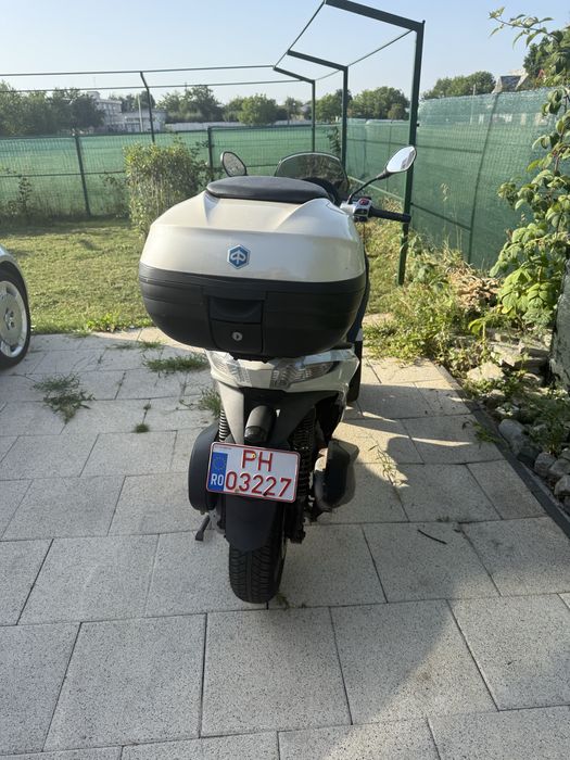 Vand triciclu 125 cmc permis B