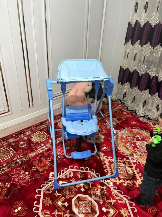 Качеля детский бук