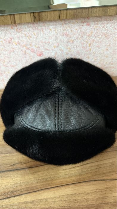 Продам новую шапку-ушанку унисекс норка /кожа