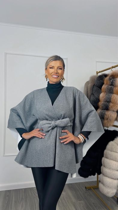 Capa deosebit de versatila si stilata marimea universala ,stofa